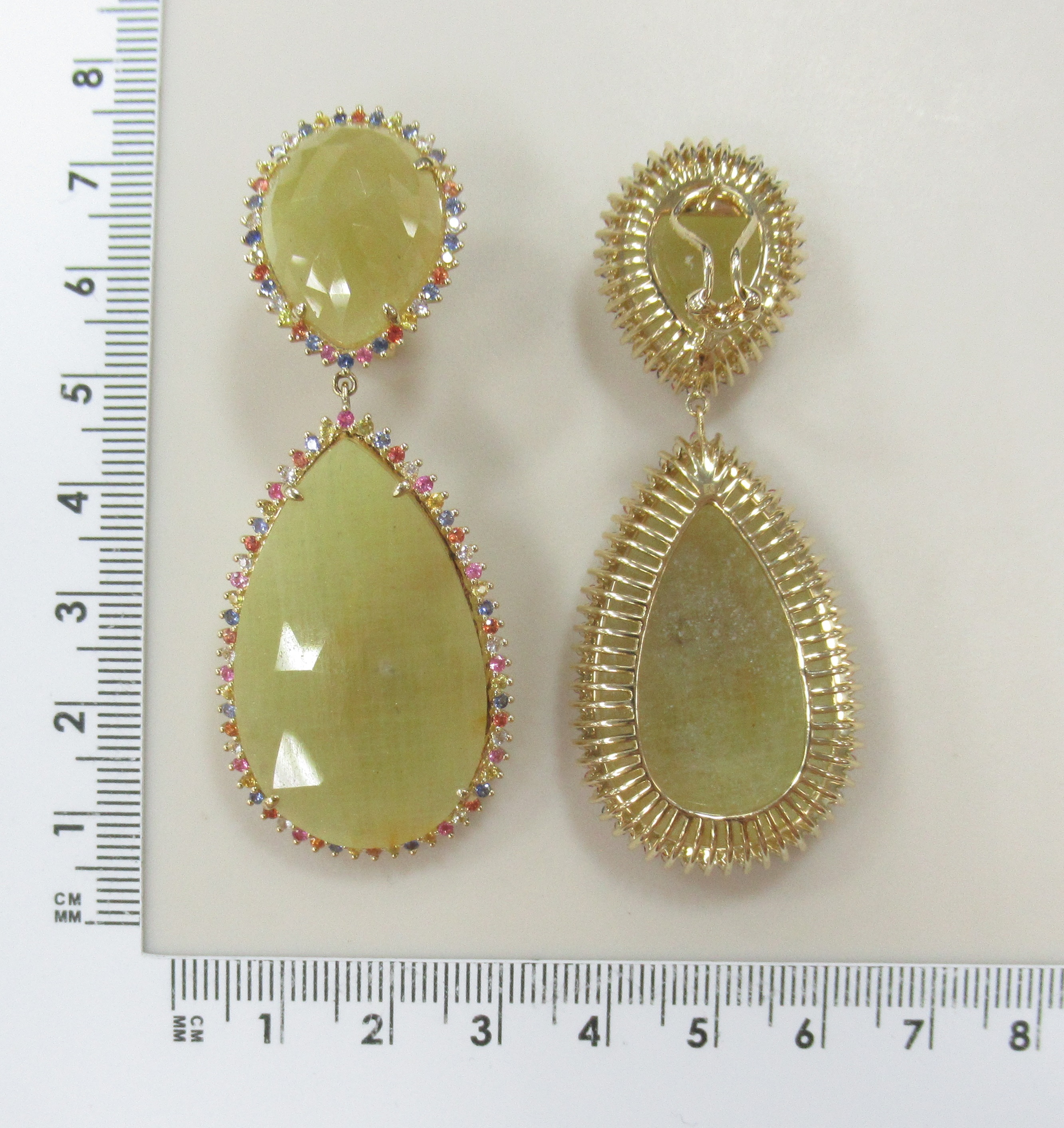 Серьги из желтого золота с корундами